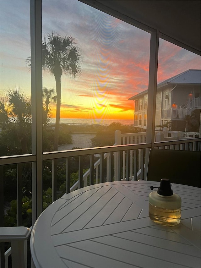 balcony at dusk with a water view