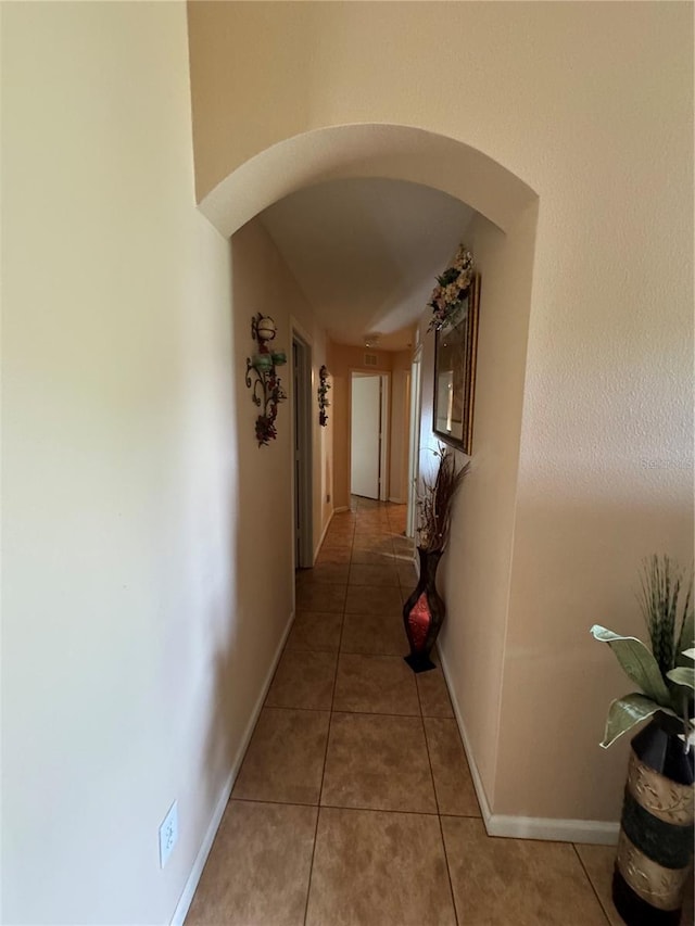 hall featuring tile patterned floors