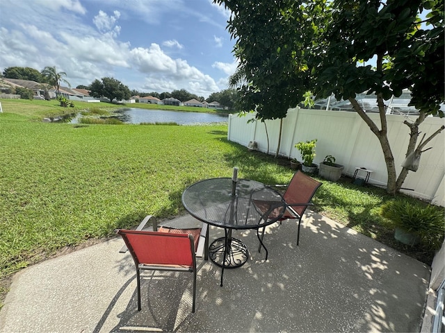 view of patio / terrace with a water view