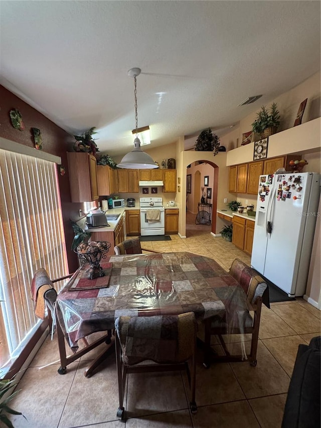 dining room featuring light tile patterned floors