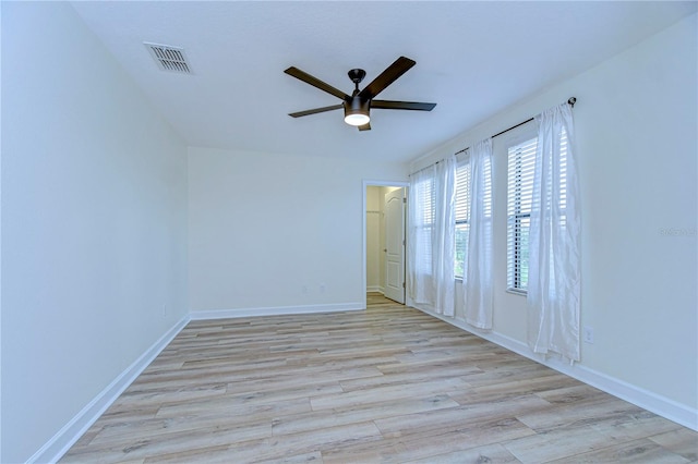 unfurnished room featuring ceiling fan and light hardwood / wood-style flooring