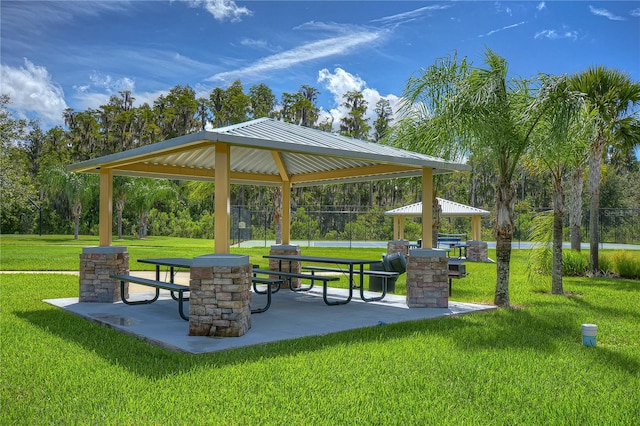 view of home's community with a gazebo and a lawn