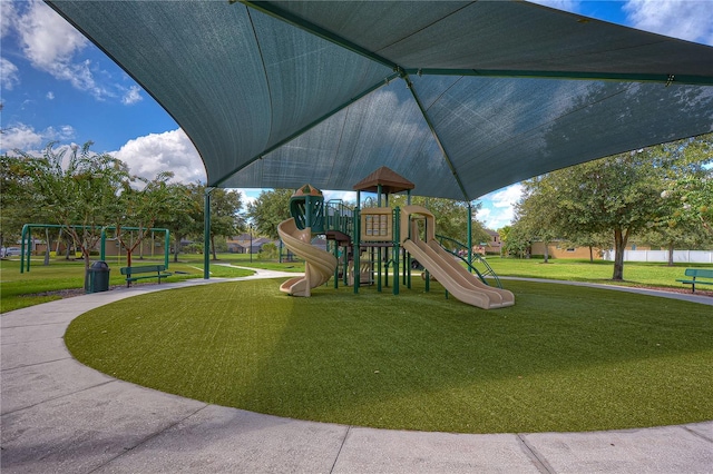 view of jungle gym featuring a yard