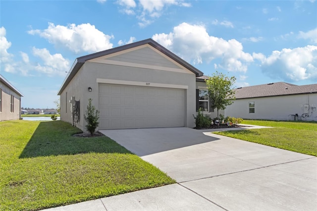 ranch-style home featuring a front yard and a garage