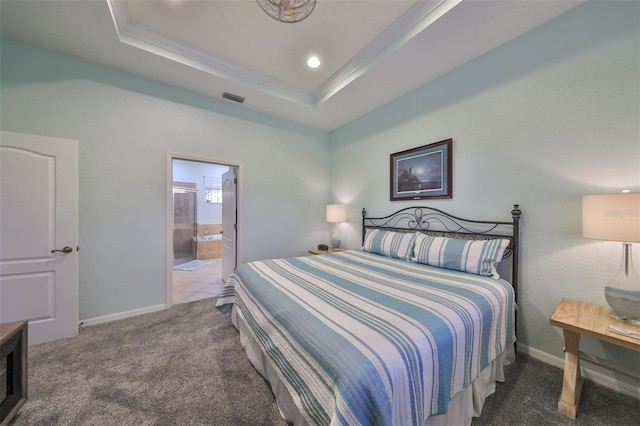 carpeted bedroom featuring ensuite bathroom, a raised ceiling, and crown molding