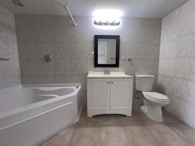 full bathroom featuring tile walls, tile patterned floors, a textured ceiling, and vanity