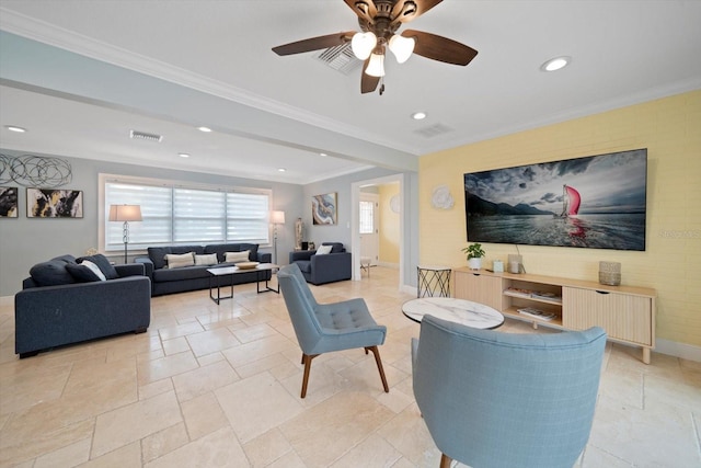 living room with ceiling fan and ornamental molding