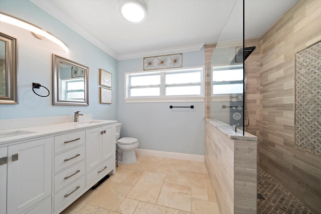 bathroom with ornamental molding, tiled shower, vanity, and toilet