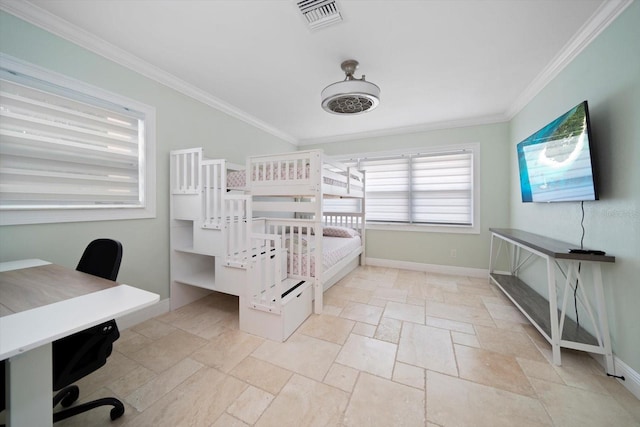 bedroom featuring crown molding