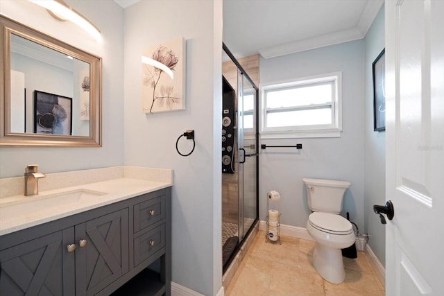 bathroom featuring vanity, ornamental molding, tile patterned floors, toilet, and a shower with door