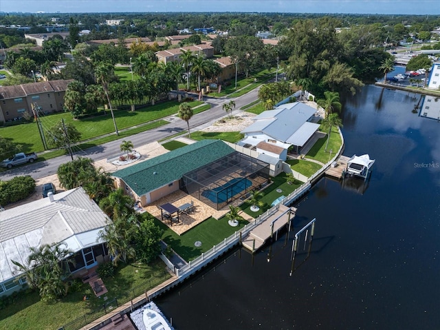 drone / aerial view with a water view