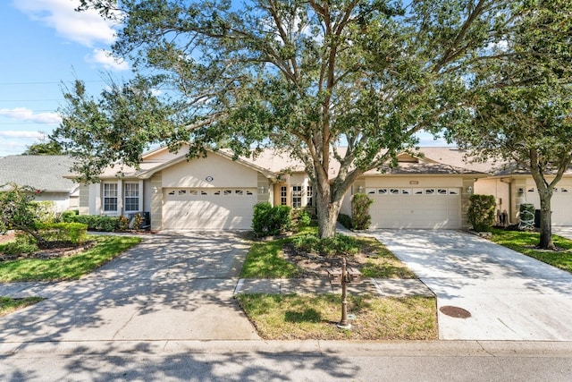 ranch-style house featuring a garage