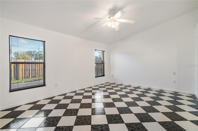 spare room with ceiling fan