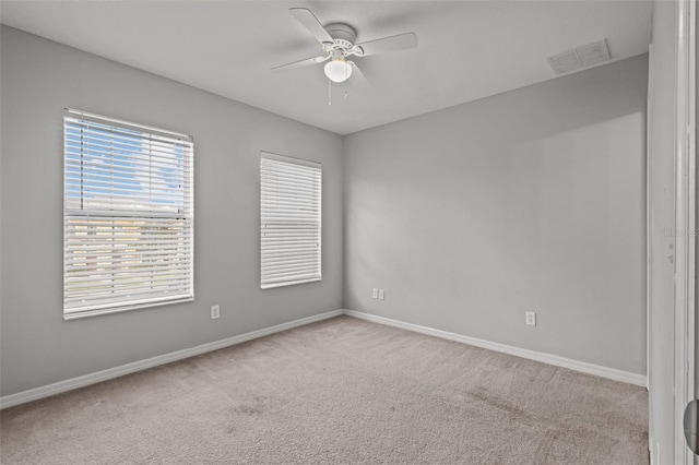 6950 Towering Spruce Dr, Riverview, FL 33578 - unfurnished room featuring baseboards, a ceiling fan, visible vents, and carpet floors