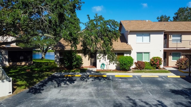 view of front of home featuring a water view