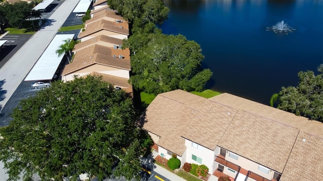 drone / aerial view with a water view