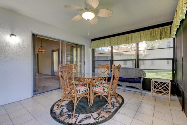 sunroom / solarium with ceiling fan