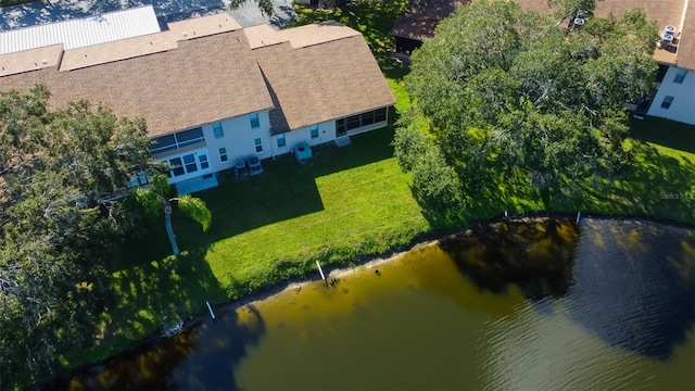 birds eye view of property featuring a water view