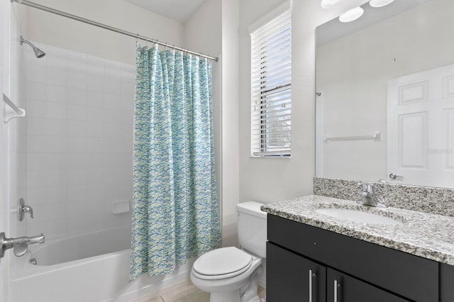 bathroom with shower / bath combo, toilet, and vanity