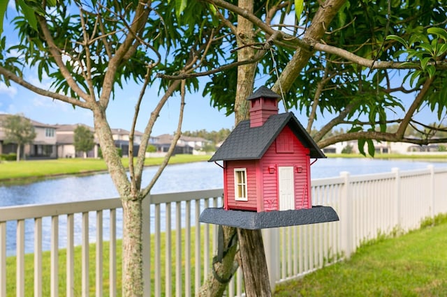 water view featuring a fenced backyard
