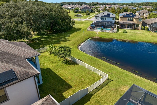 aerial view with a residential view and a water view
