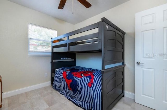 bedroom featuring ceiling fan