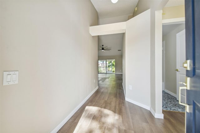 corridor featuring hardwood / wood-style flooring