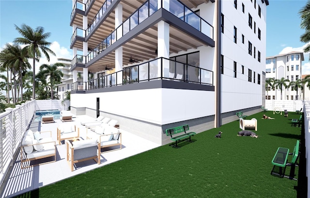 view of community with outdoor lounge area and a patio area