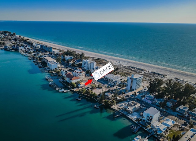 bird's eye view with a beach view and a water view