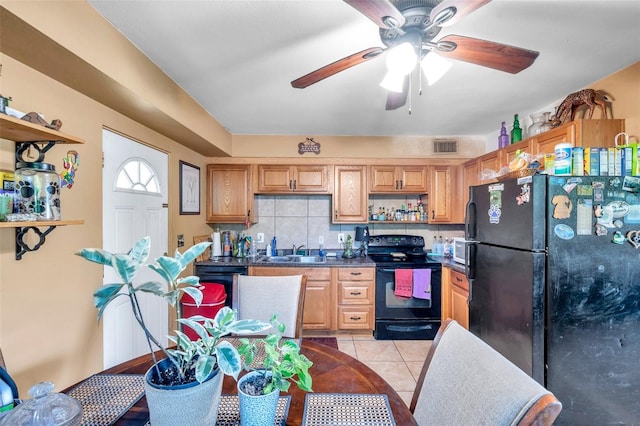 kitchen with ceiling fan, light tile patterned floors, sink, backsplash, and black appliances