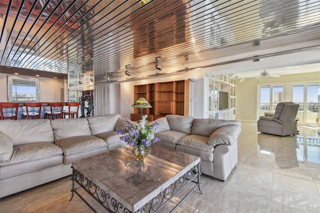 living room with ceiling fan