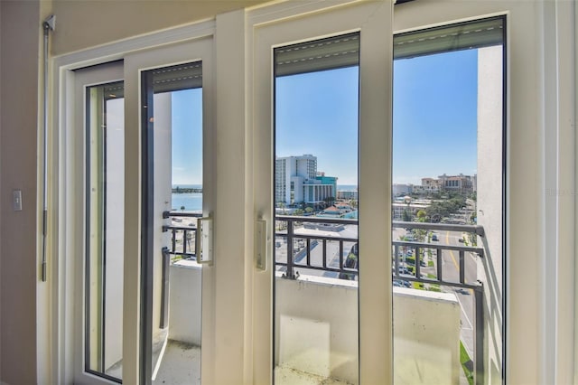 entryway with a water view and a wealth of natural light