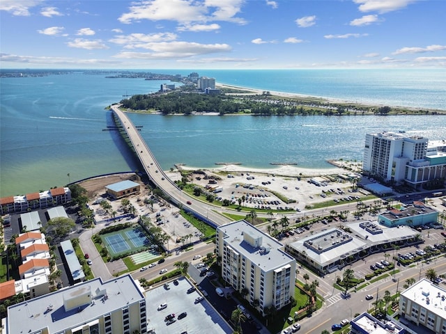 birds eye view of property featuring a water view and a view of city