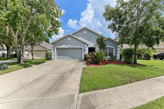 single story home featuring a front yard and a garage