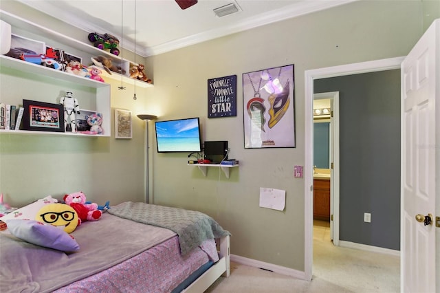 carpeted bedroom featuring crown molding