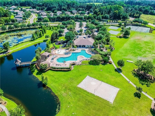 birds eye view of property with a water view