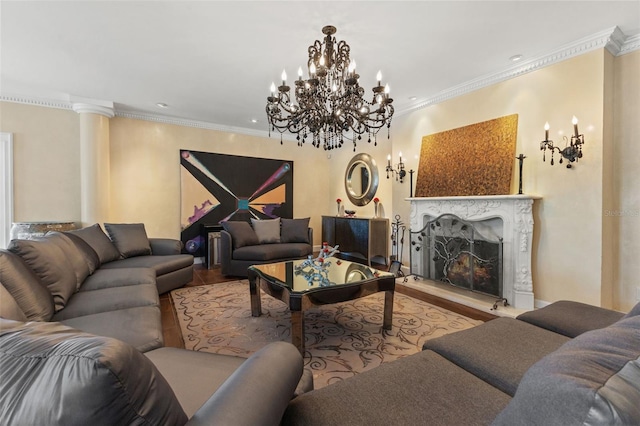 living room featuring light hardwood / wood-style flooring, decorative columns, and ornamental molding