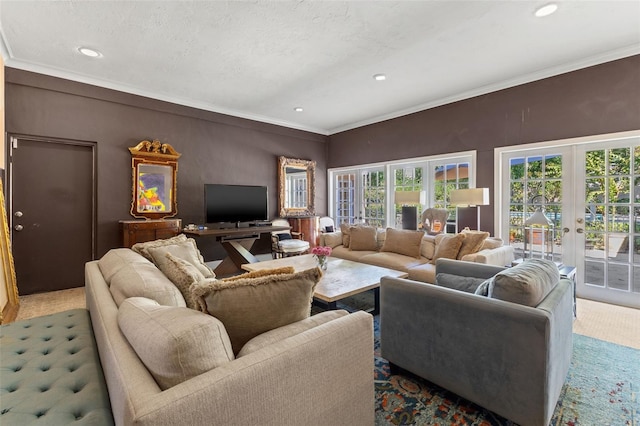 living room with french doors, light colored carpet, a textured ceiling, and ornamental molding