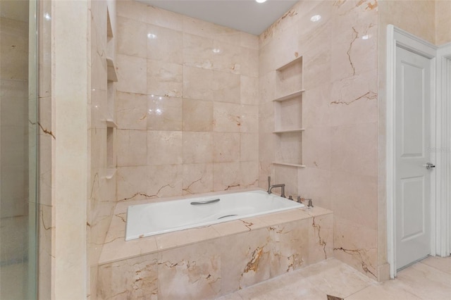 bathroom with separate shower and tub