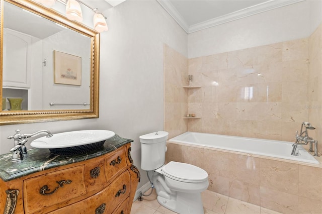 bathroom featuring tile patterned flooring, crown molding, vanity, and toilet