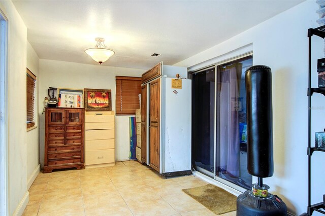 kitchen featuring light tile patterned flooring