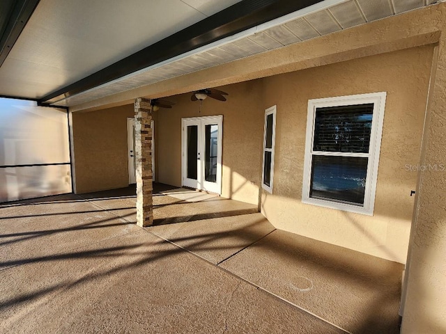 view of patio / terrace featuring ceiling fan and french doors