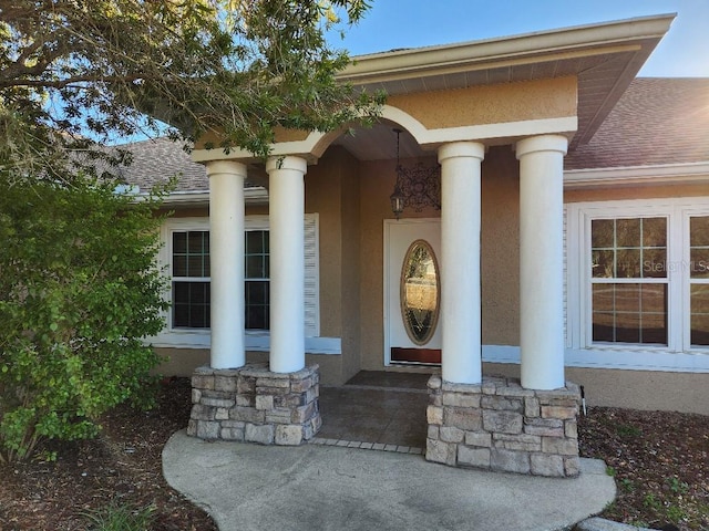 property entrance with covered porch