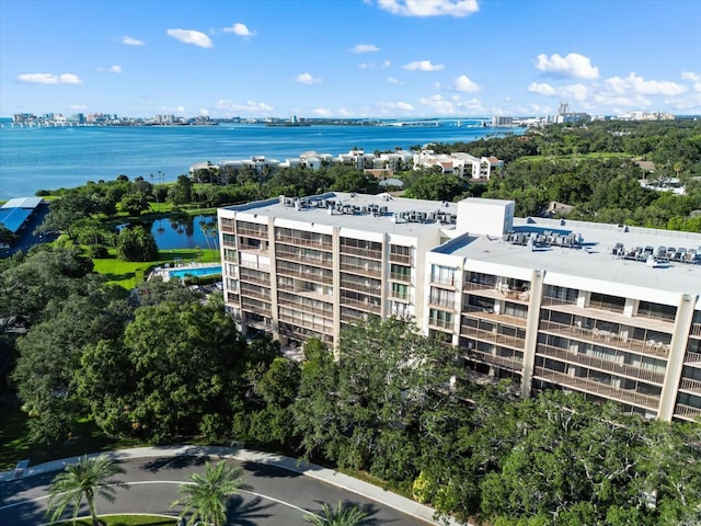 drone / aerial view featuring a water view and a city view