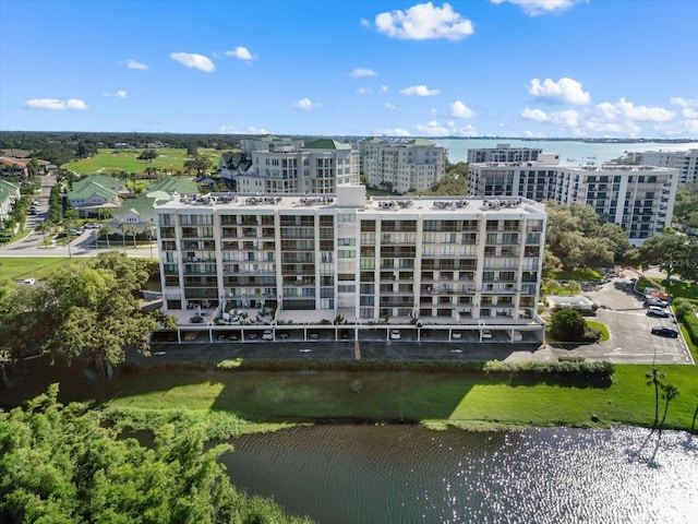 aerial view featuring a water view and a city view