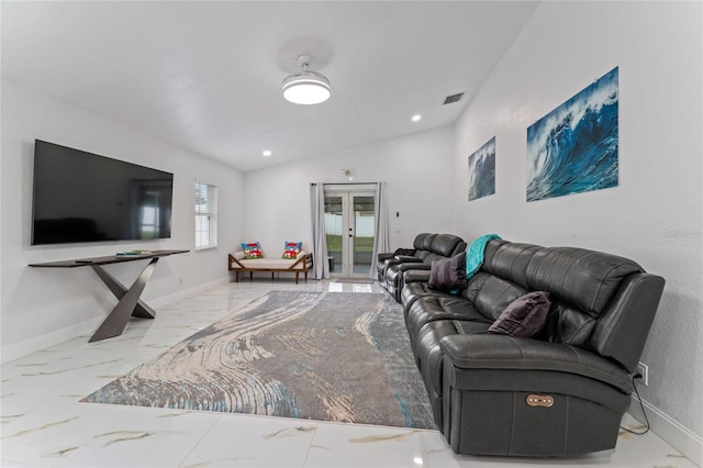 living room featuring vaulted ceiling