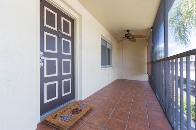 property entrance featuring ceiling fan