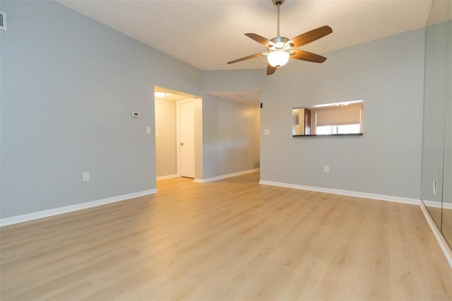 unfurnished living room featuring ceiling fan and light hardwood / wood-style flooring