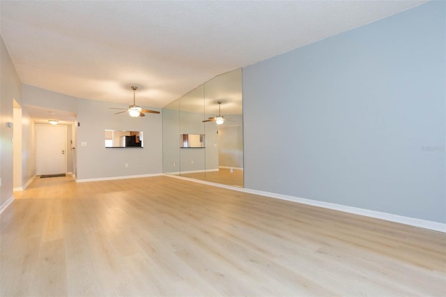 unfurnished living room with light hardwood / wood-style flooring