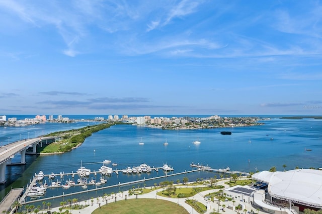 birds eye view of property with a water view